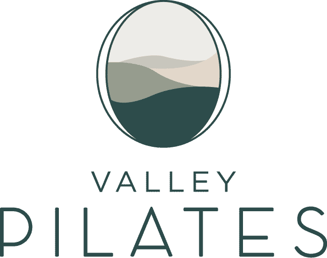 An oval shape captures the shapes and colours of the Currumbin Valley in the Valley Pilates logo.